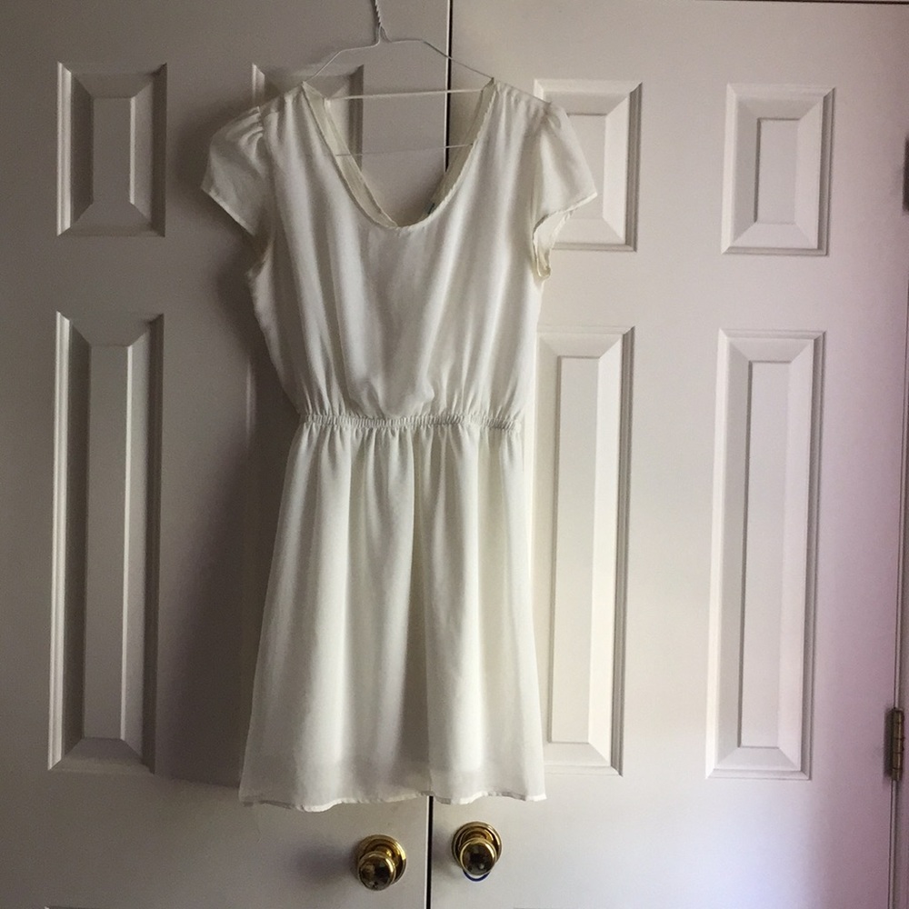 White chiffon material dress. Lined. Size small.